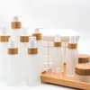 50ml 100ml 120ml 150ml Flat Shoulder Frosted Glass Spray Pump Bottles with Bamboo Lid for Skin Care Serum Lotion Shampoo Shower Gel Toi Lucg