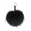 Puszysty prawdziwy futra kulki kreki bolejne rzemieślnicze DIY POMPOM Black POre Keyring UK Kobiet Bag Accessories Prezes 45013332879