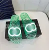Luxurys Fashion Sandali piatti di vendita calda per pantofole casual da donna Estate Trasparente Solid Beach Scarpe da uomo da bagno Taglia 35-45 con scatola