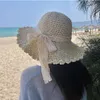 Cappelli a tesa larga OMEA Estate Cappello di paglia Pizzo Spiaggia Donna Coreano Nastro antivento Pieghevole Sole Elegante Lolita Secchiello per le vacanze