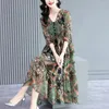 Robes décontractées femme robe femme été 2023 Vintage col en v mode florale sept points manches jupe