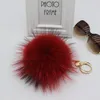 Keychains Luxury 15cm Fluffy Real Fur Ball Pom Poms Pompom Raccoon Keychain Car Key Chain Metal Ring Pendant For Women