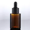 Bottiglie di profumo di olio essenziale di vetro da 30 ml Flacone contagocce per reagente liquido Flacone cilindrico a spalla piatta Trasparente / Smerigliato / Ambra Axbok