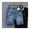 Jeans pour hommes été Denim Shorts haute rue gratté trou imprimé mode coréenne Fit Quintuple pantalon hommes 230615
