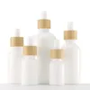 Wit Porselein Glazen Etherische Olie Flessen Huidverzorging Serum Druppelflesje met Bamboe Pipet 10ml 15ml 20ml 30ml 50ml 100ml Sirnd