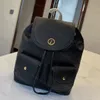 Zaino di design unisex Borsa a tracolla in tinta unita Borsa da scuola alla moda in PU Scomparto interno Zaino di grande capacità Uso multiuso