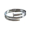 Électroplent le nouveau bracelet de tête de clou de haute version Femelle Spring Opening Carte C A5SX 300385