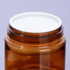 Quality Amber PET Plastic Jars Round Leak Proof Cosmetic Foods Containers Bottle with Black PP Lids & White Gasket 2oz 33oz 4oz Abvus