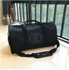 COCO Designer sac fourre-tout Laser Duffel Sacs Bandoulière Sacs à main Voyager GYM Portefeuilles Sacs à bandoulière Luxurys Femmes Hommes Lady Totes Sac à main Sac à dos Messenger Cadeau Noir