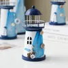 Oggetti decorativi Figurine Stile mediterraneo Nautico Oceano Flash Faro Rete da pesca Guscio di stelle marine Faro in metallo Torre Fermacarte Ornamento 230616