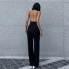 Kvinnors jumpsuits rompers Xeemilo sexig backless spaghetti rem jumpsuit kvinna sommar svart mager bodycon bodysuit byxor semester damer casual jumpsuits 230616