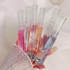 Lipgloss, Glas, Wasser, feuchtigkeitsspendend, Glühöl, transparente Temperatur, Farbwechsel, prallere Lippen, Pflege, Lippenstift