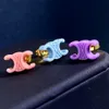Chandelier Nouveau conception de couleurs de chandail enlacieuse conçue conçue Bracelet Macaron Conception de boucles d'oreilles en résine printemps et en été concepteur