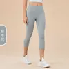 Stroje LU27 Wysoka talia Capris Yoga Pants Women's Back Pocket Nude Sports Fitness Gym Leggins