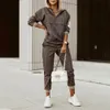 Mode kvinnors casual sport sätter nya europeiska och amerikanska smala plädtryck breda suspender, sexig jumpsuit för kvinnor