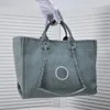 2023 Designer-Strandtasche, luxuriöse Denim-Einkaufstasche, große Kapazität, Reise-Mama-Tasche, Damen-Taschen, Modekette, Umhängetasche, Handtasche, hochwertige Designer-Taschen