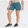 Pantalones cortos de yoga a la moda a través de cintura alta para mujer