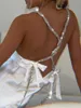 Vestidos casuais femininos sexy sem costas vestido sem costas 2023 verão moda feminina bandagem cor sólida strass cetim festa boate mini