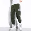 Byxor 2021 Streetwear Men Black Joggers Pants Mens Big Pockets Ribbons Hiphop Cargo Pants Male Overalls Sweatpants Men kläder S5XL