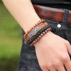 Strand 1PCS MEN'S RETRO PUNK LEATHER BACELTS منسوجة سبيكة القيل والقال متعدد الطبقات على نطاق واسع المجوهر