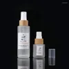 Garrafas de armazenamento por atacado 20/50/60/80/100ml 1 OZ vidro fosco cosmético álcool spray corporal spray de bambu bomba recipientes