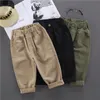 Pantolon moda bebek gündelik pantolon pamuk düğmesi bebek çocuk çocukları uzun erkekler gevşek pantolon kıyafetleri 110y 230617