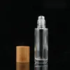 5 ml 10 ml butelki olejku eterycznego Clear Glass Roll na butelce perfum z naturalną bambusową czapką stali nierdzewnej piłka qugba