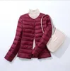 Down jacket New lightweight female white duck down autumn and winter large slim short coat