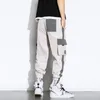 Byxor 2021 Streetwear Men Black Joggers Pants Mens Big Pockets Ribbons Hiphop Cargo Pants Male Overalls Sweatpants Men kläder S5XL