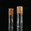 5 ml 10 ml butelki olejku eterycznego Clear Glass Roll na butelce perfum z naturalną bambusową czapką stali nierdzewnej piłka qugba