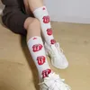 Femmes chaussettes printemps mode personnalité lèvre Tube coton pour hommes et mollet J K marée collège vent basket-ball