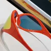 90年代の楕円形のサングラスフルーオレンジ0285Sウェーブマスクサングラスデザイナーメングラスレッドレンズオーバルフレーム2023シリーズ滑走路スタイルレディースカジュアルファッションサングラス