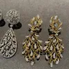Ciondola il lampadario Foydjew Gioielli retrò italiani Orecchini a forma di foglia cava Micro-intarsiato Pieno zircone Ciondola l'orecchino per le donne Accessori per banchetti 230617