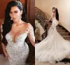 Arabiska sjöjungfrun lyxiga bröllopsklänningar Dubai glittrande kristaller Långa ärmar Brudklänningar Court Train Tulle kjol Robes DE BC