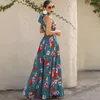 Grundläggande casual klänningar Wildpinky Summer Floral Print Dress Women Sexig elegant halter Maxi Kvinnlig strandband SASHES ALINE CHIC 230619