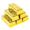 Novel Games 1/3/6pcs Plastic Fake Gold Bullion Simulated Golden Brick Fake Glittering Gold Bar Pappersvikt Dörrstopp Film Prop Novelty Gift 230617