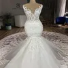 2019 sexy Mermaid Trouwjurken kapel Trein 3D kant Applicaties juweel hals prachtige illusion lace bruidsjurken aangepaste vestido224A