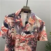 Män designer skjortor sommar shoort hylsa casual skjortor mode lösa polos strandstil andningsbara tshirts tees kläder m-3xl q43