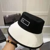 Hot design spring and summer models with wide edge sun protection sun hat simple black and white collision color fisherman's hat