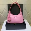 Bolsa tiracolo feminina de design de alta qualidade moda bolsa clássica para axilas nicho versátil pano de náilon rosa portátil com zíper bolsa de ombro de náilon