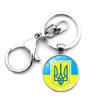 Llaveros Lindo colgante de llavero ucraniano Bolso de coche de moda para hombres y mujeres con llavero de botón de langosta de metal