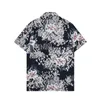 Mężczyźni designerskie koszule Summer Shoort Sleeve Casualne koszule moda luźna polo w stylu plażowym oddychając Tshirts Tees odzież M-3xl Q8