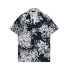 Mężczyźni designerskie koszule Summer Shoort Sleeve Casualne koszule moda luźna polo w stylu plażowym oddychając Tshirts Tees odzież M-3xl Q8