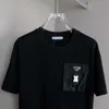 Camisetas Masculinas Designer 2023 Verão Novo Bolso Manga Curta T-shirt Moda Casual Gola Redonda Esportes Branco Preto Alta Qualidade Top NSFU