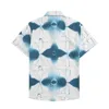 Hommes Designer Chemises D'été À Manches Courtes Chemises Décontractées Mode Lâche Polos Plage Style Respirant T-shirts T-shirts Vêtements M-3XL Q14