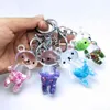 Keychain Moving Glitter Quicksand Liquid Sweet Bear Acryl Car Bag Accessories Hanger Kvinnor Kids Poison Drink218b