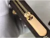 Portefeuille de créateurs portefeuille de luxe M60017 Femmes / hommes Coin Coin Purse Lady Poke Carte Holder Top Quality Leather Luxury Coin Purse Holder Tote Sac 0898