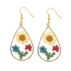 Boucles d'oreilles pendantes ovale clair plat encadré pressé véritable fleur séchée jonquille pétale résine pendentif boucle d'oreille marguerite fleur crochet