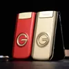 Unlocked Flip GSM Mobiltelefoner Metal Body Senior Luxury Dual Sim Cards Camera Mp3 Mp4 Torch Big Button Elder Mobile