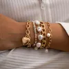 Schakelarmbanden Europese en Amerikaanse accessoires Gevormde imitatieparel Retro barokke armband Vrouwelijke micro-ingelegde liefdesset